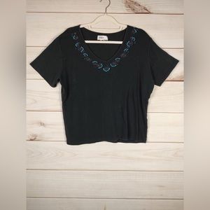 Kikit L T-Shirt Woman’s Black Crop With Sewn On Beads Around V-Neck.